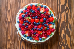 Top view delicious cake with berries